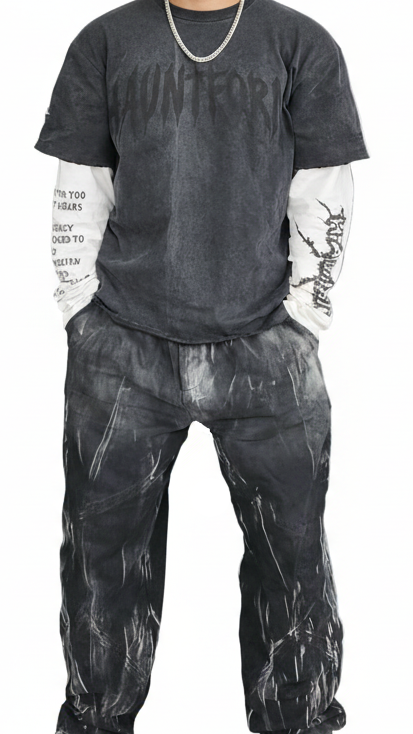 Person wearing a dark gray t-shirt and pants on a white background