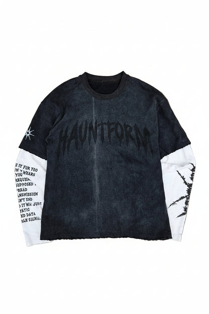 Black and white jacket with text design on a beige surface